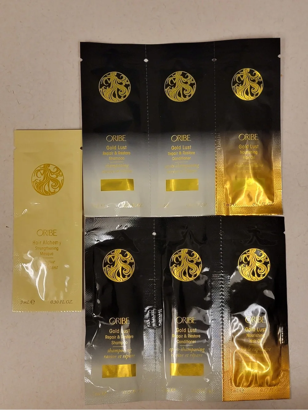 Oribe Gold Lust Sample Sachet Trio Pack - Set of 2 + Hair Alchemy Masque Sachet